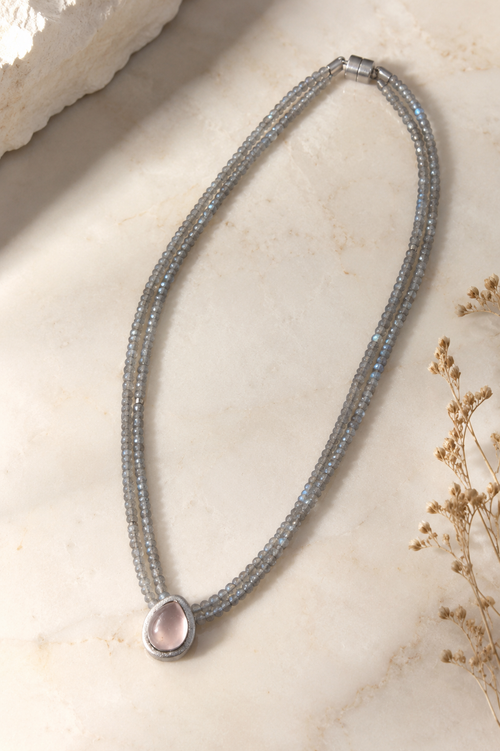 Handmade two strand Labradorite necklace featuring a 9x12mm pear-shaped Rose Quartz pendant in a matte dark sterling silver setting with a sterling silver magnetic clasp.