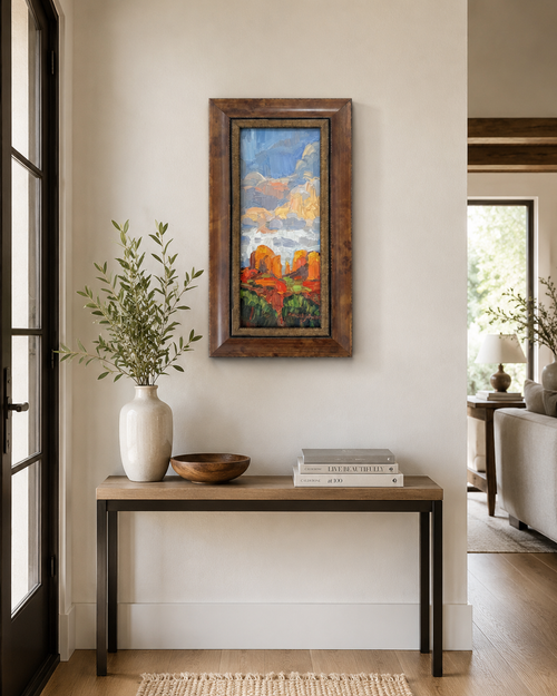 Last Light Cathedral Rock Sedona oil painting by Russell Johnson displayed in a modern entryway, framed original Arizona landscape art from Raku Gallery