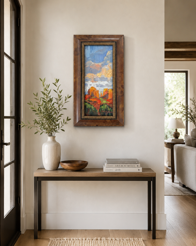 Last Light Cathedral Rock Sedona oil painting by Russell Johnson displayed in a modern entryway, framed original Arizona landscape art from Raku Gallery