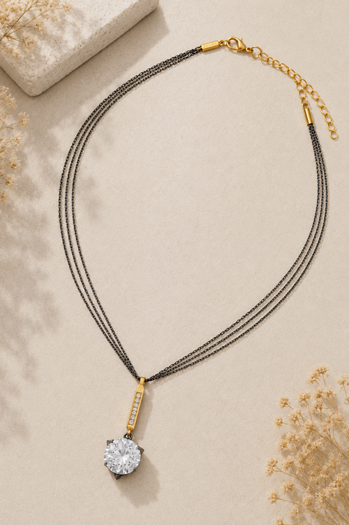 Luxury crystal pendant necklace with three layered oxidized sterling silver chains, gold plated sterling silver cubic zirconia bar, and brilliant 12mm crystal.