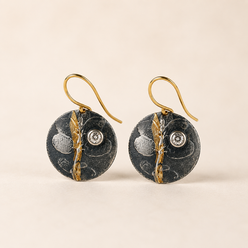 Luxury handmade sterling silver artisan earrings with gold accents and cubic zirconia from Raku Gallery