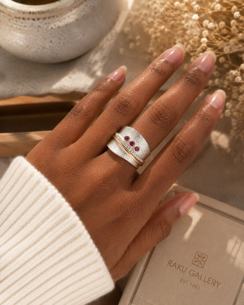 Luxury lifestyle photo of rhodolite garnet ring from Raku Gallery