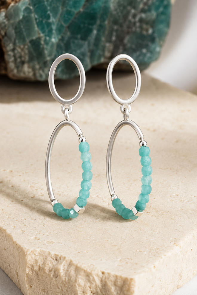 Handmade matte sterling silver oval drop earrings featuring genuine amazonite gemstone beads and sterling silver cube accents. Modern artisan jewelry handcrafted for everyday elegance.
