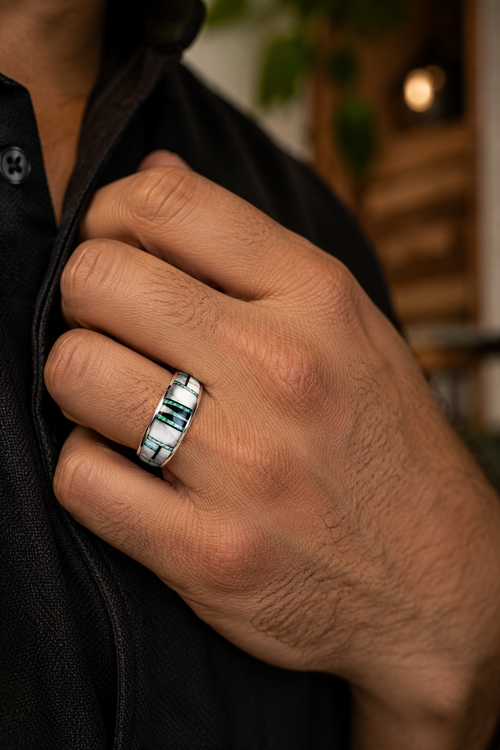 Men's Native American turquoise inlay ring in sterling silver shown on hand