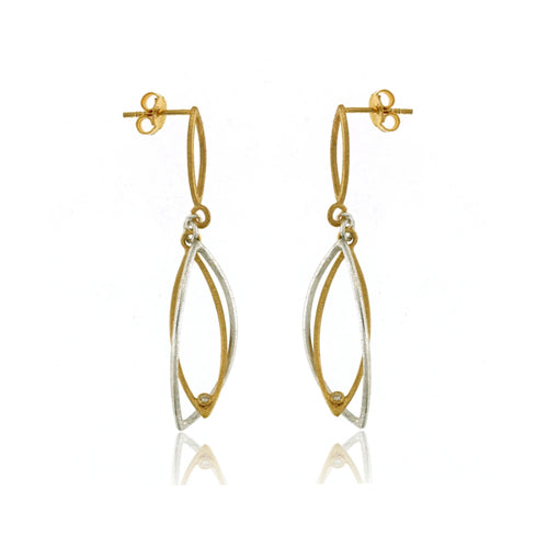 One-of-a-kind mixed metal marquise earrings handcrafted in sterling silver and 18 carat gold vermeil with white cubic zirconia accents displayed in a luxury jewelry setting