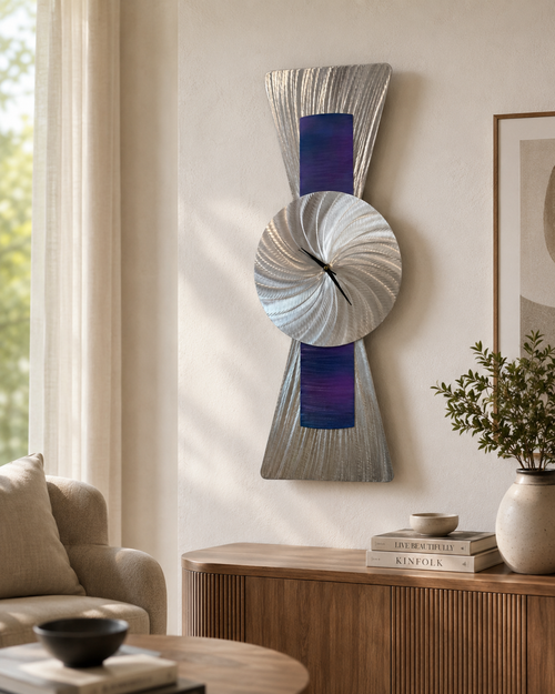 Contemporary brushed aluminum wall clock displayed in a modern living room setting