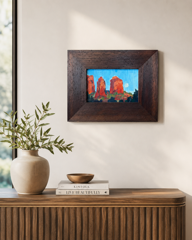 Moon Rising Cathedral Rock Sedona oil painting by Russell Johnson displayed in a modern home, framed original Arizona landscape art from Raku Gallery