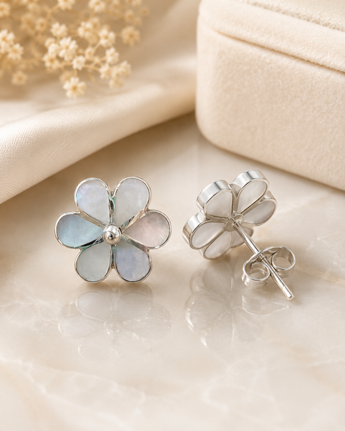 Mother of pearl flower stud earrings showing front design and sterling silver post back closure