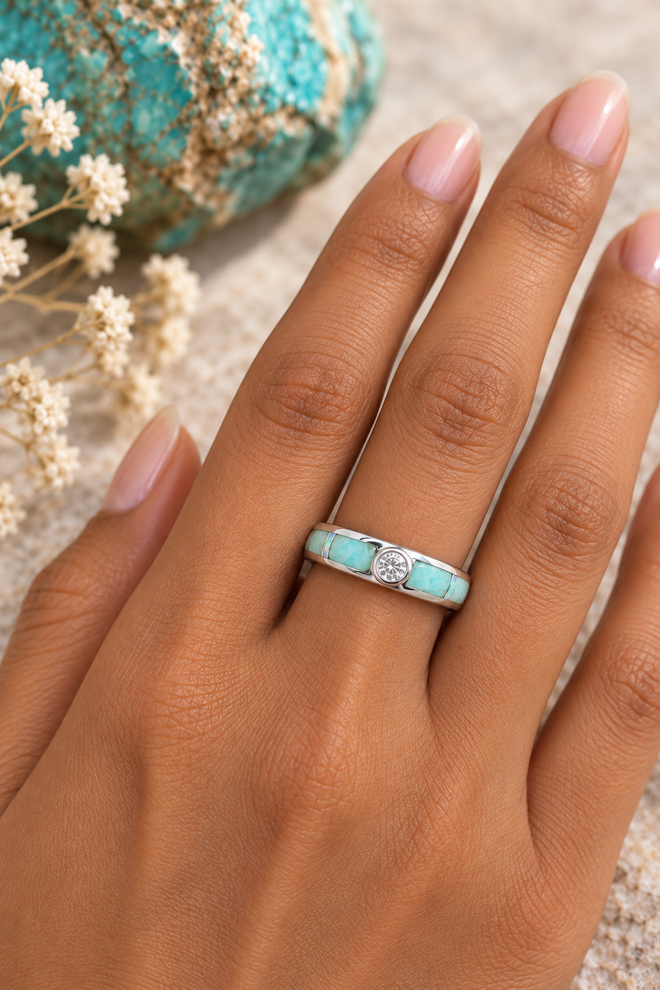 Native American Navajo opal and amazonite sterling silver inlay ring shown on hand.