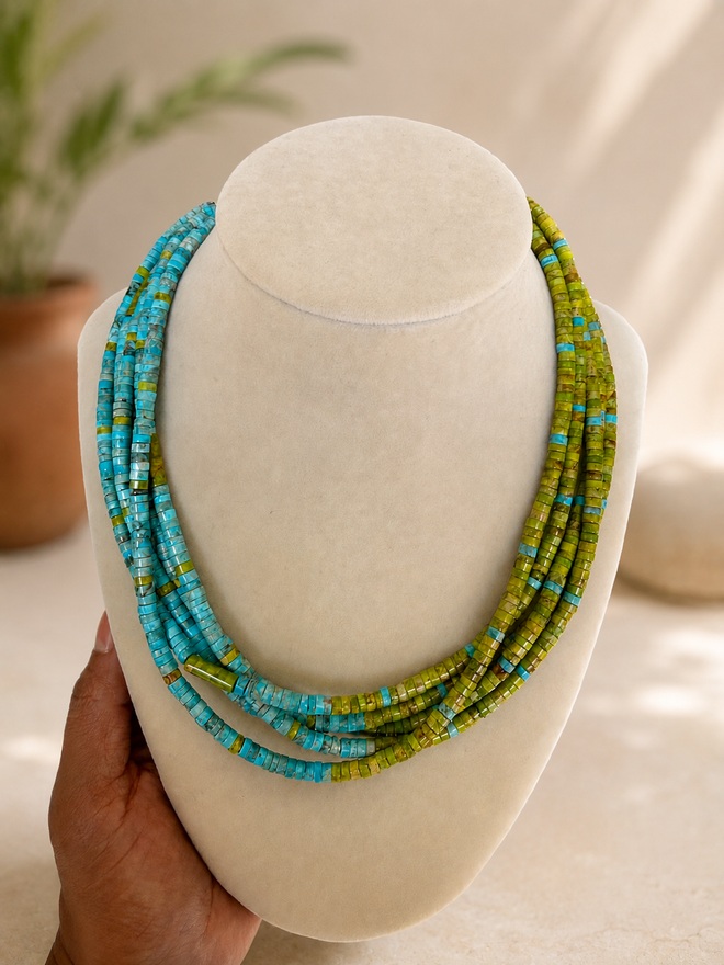 Native American five-strand turquoise and apple coral heishi bead necklace by a Kewa Pueblo artist