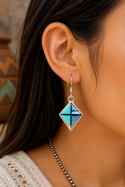 Native American turquoise and opal geometric inlay earrings by Navajo artist Marlene Begay shown on ear