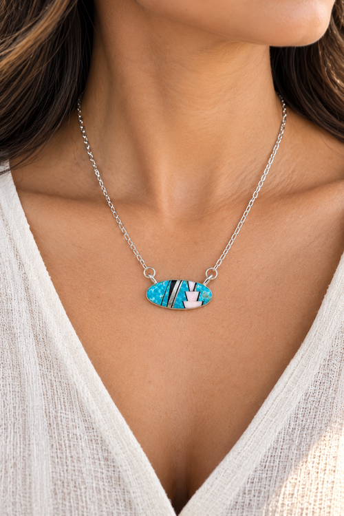 Handmade Native American turquoise necklace with pink Peruvian opal geometric inlay and sterling silver chain