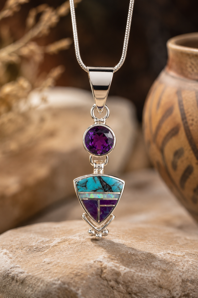Authentic Navajo sterling silver pendant with amethyst, Arizona Kingman Turquoise, sugilite, and cultured opal displayed in a luxury Southwestern setting.
