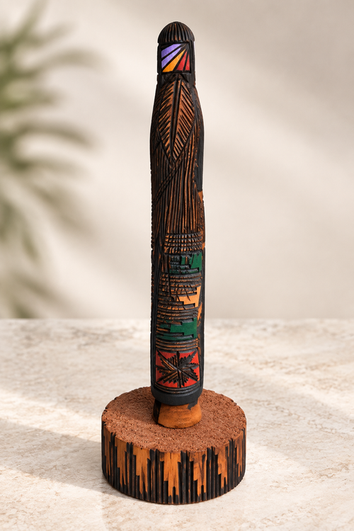 Back view of Navajo cottonwood Kachina doll showing intricate carved and painted details by Jerald Guy