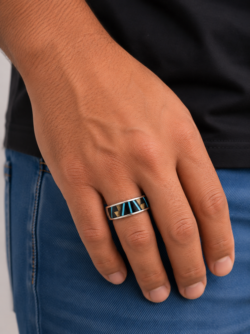 Authentic Navajo sterling silver inlay ring featuring genuine Kingman turquoise, black jade, and Tiger's Eye Jasper on a man's hand.