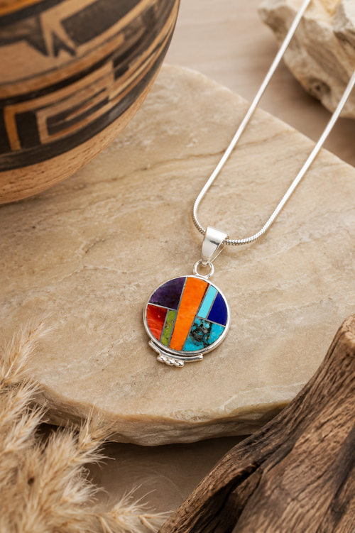 Handmade Navajo sterling silver pendant with Orange Spiny Oyster, Turquoise, Lapis, Sugilite and Gaspeite inlay on a sterling silver snake chain.