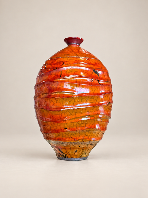 One-of-a-kind handmade ceramic vase with narrow neck and layered ferric chloride finish
