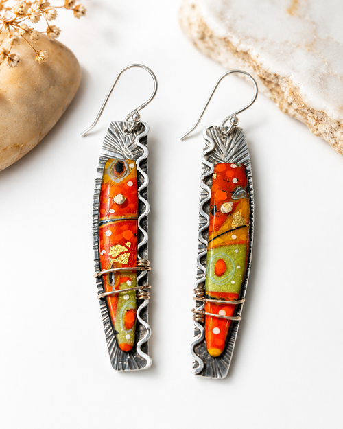 Orange art glass dangle earrings in sterling silver with handcrafted colorful glass accents.