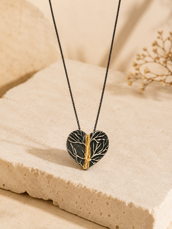 This one-of-a-kind Tree of Life Heart Necklace is handcrafted in Sedona, Arizona in oxidized sterling silver—a timeless symbol of love, growth, and strength.