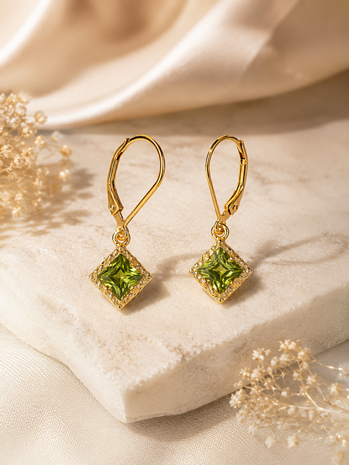 Elegant 18k gold vermeil drop earrings featuring sparkling square-cut natural peridot gemstones, August birthstone jewelry.

Sedona Authentic Jewelry
Shop in Jerome AZ