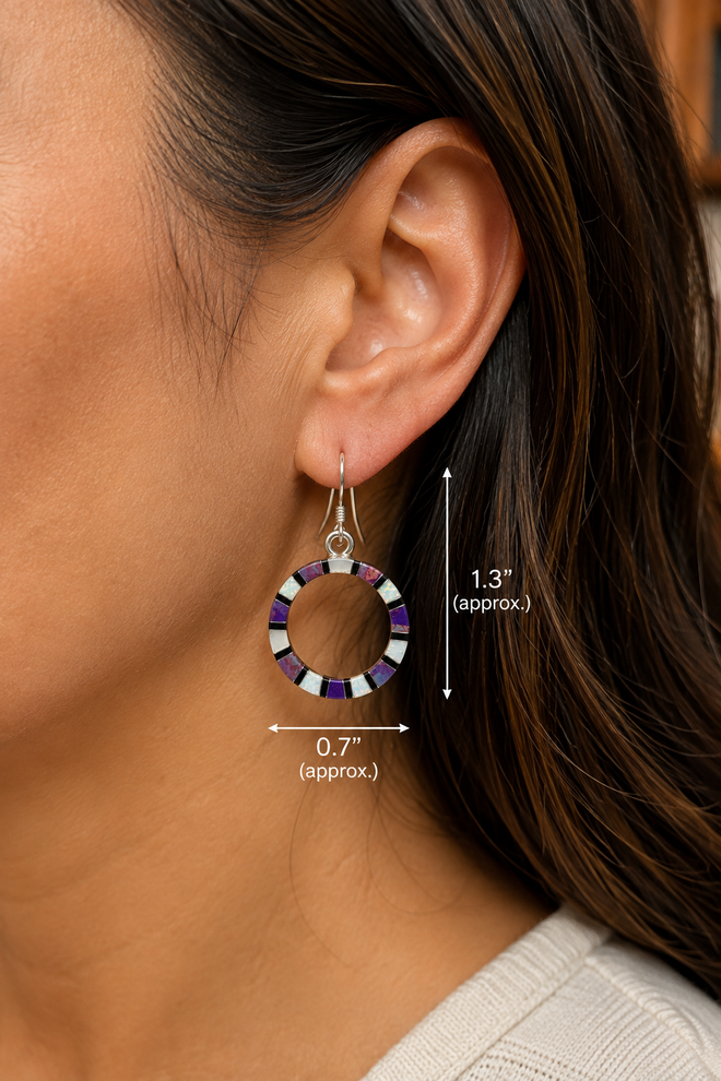 Purple and opal inlay sterling silver hoop earring shown on ear, approximately 1.3 inches long and 0.7 inches wide