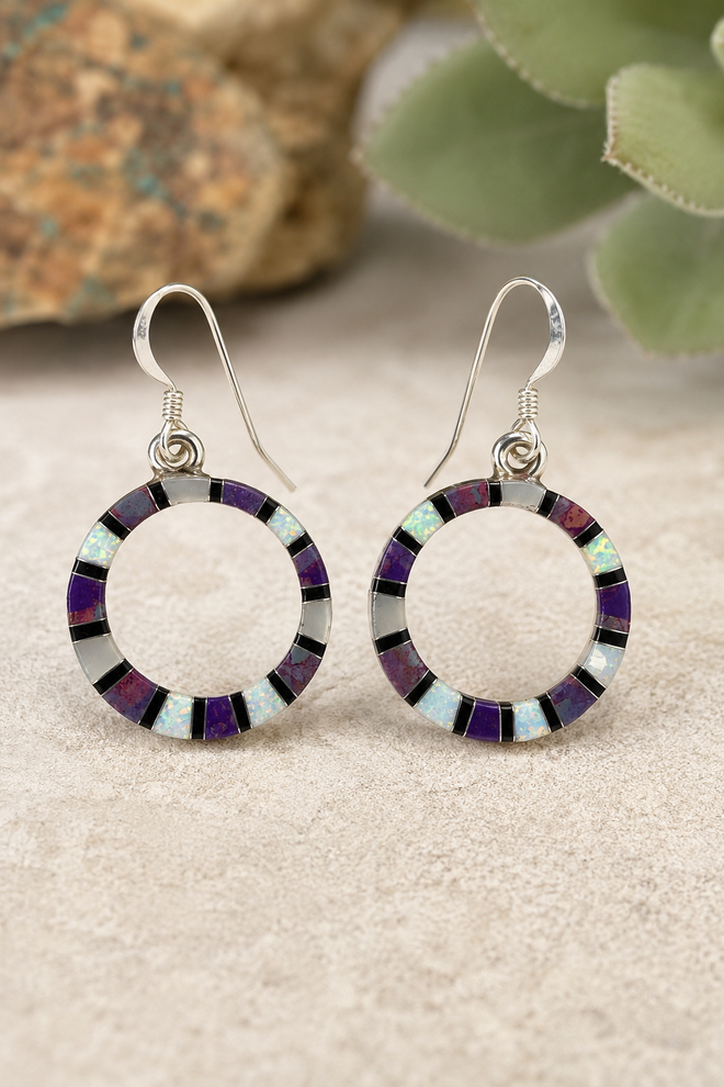 Purple and opal inlay sterling silver round hoop earrings with black and white stone accents.