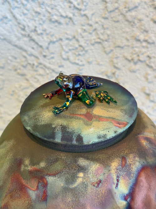 Raku fired lidded vessel suitable as a decorative pot or custom cremation urn