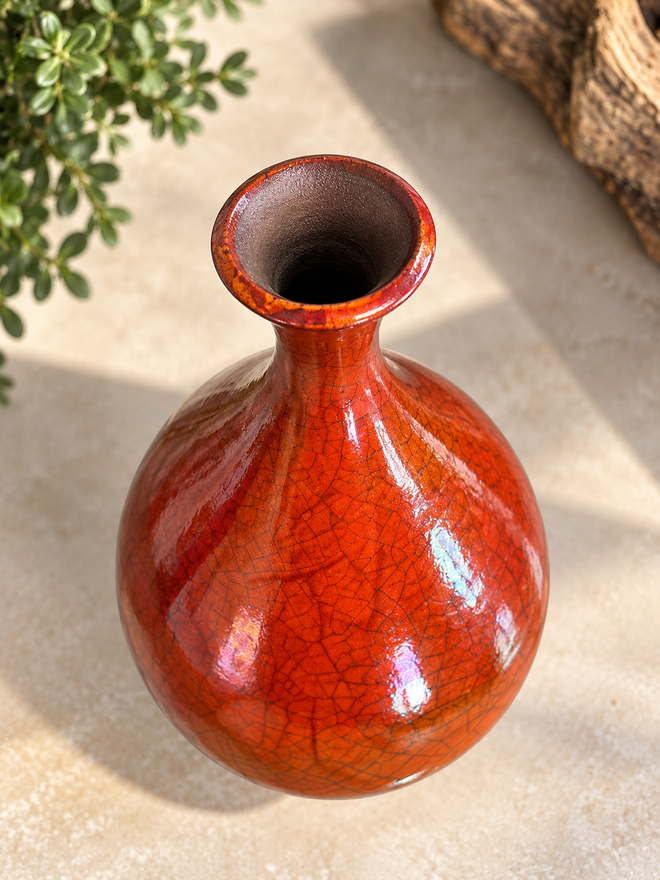 Top view of Bob Smith Raku pottery showing the flared neck and crackled surface created with the rare ferric chloride firing technique