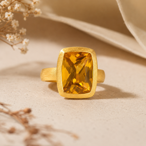 Handmade rectangular citrine ring in brushed gold vermeil with a bezel-set golden gemstone, artisan fine jewelry available at Raku Gallery Arizona.