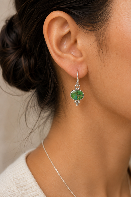 Petite Sonoran Turquoise sterling silver dangle earring shown on ear