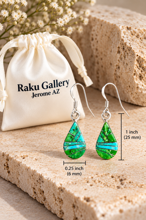 Green and blue Sonoran turquoise inlay earrings in sterling silver displayed beside a Raku Gallery satin jewelry gift pouch.