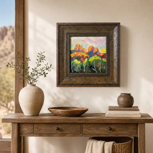 Spring in Sedona Cathedral Rock oil painting by Russell Johnson displayed in a warm entryway, framed original Sedona landscape art from Raku Gallery in Jerome Arizona
