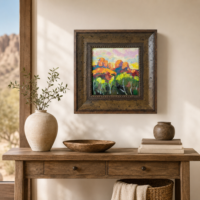 Spring in Sedona Cathedral Rock oil painting by Russell Johnson displayed in a warm entryway, framed original Sedona landscape art from Raku Gallery in Jerome Arizona