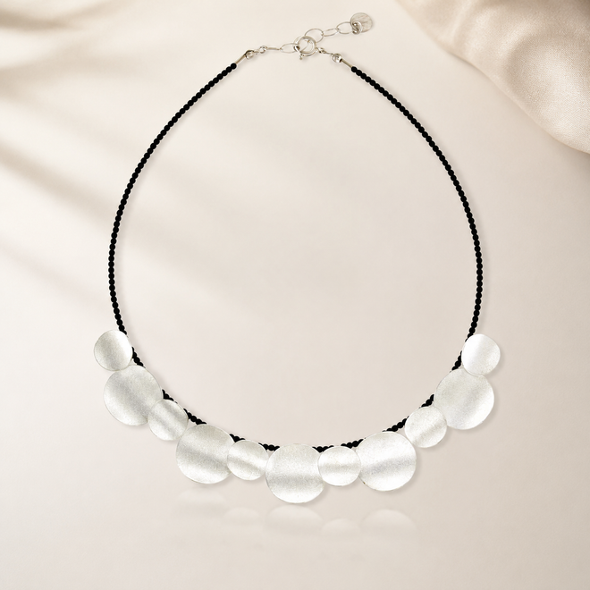 Sterling silver curved disc necklace with black onyx beads