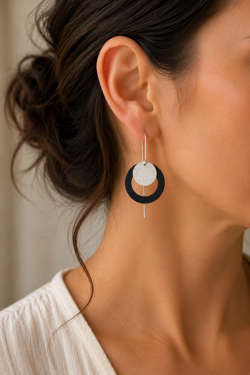 Sterling silver eclipse drop earrings with contrasting polished and oxidized silver circles