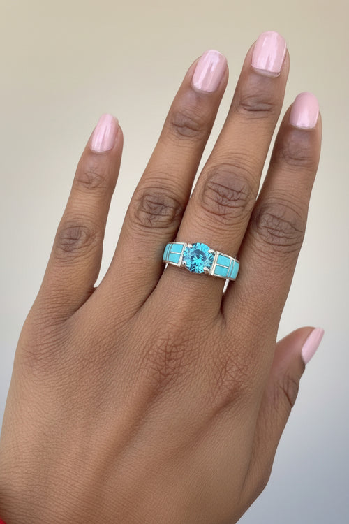 Sterling silver Navajo ring with Arizona Kingman turquoise inlay and bright blue topaz