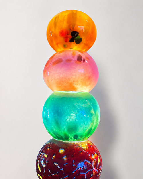 Close up of the top glass forms on a multicolor handblown glass light tower
