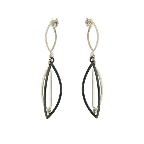 Unique handmade sterling silver and oxidized silver earrings with cubic zirconia accents from Raku Gallery in historic Jerome Arizona near Sedona.