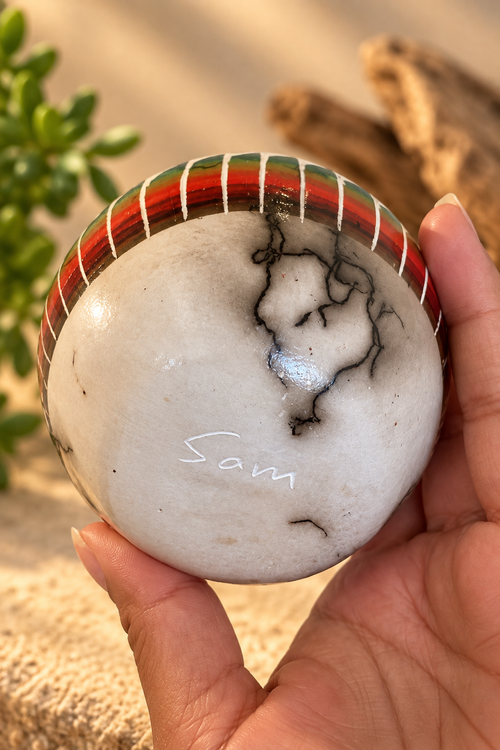 Signed underside of Vanessa Sam Navajo horsehair pottery showing the artist signature and natural horsehair markings