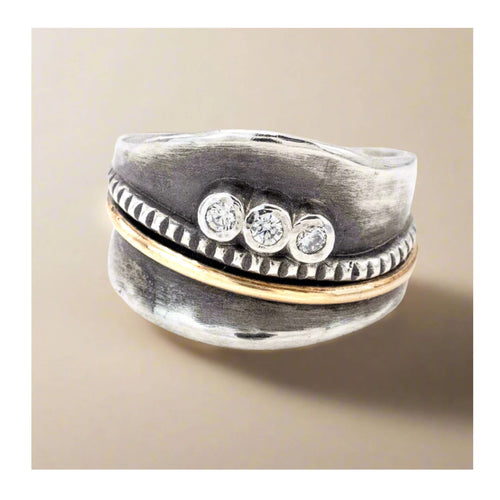 Wide band sterling silver ring with gold accent and sparkling CZ stones